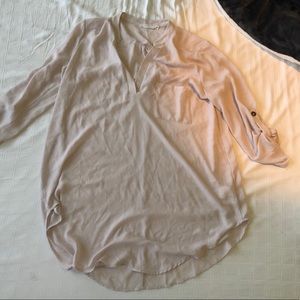 Very pale lilac blouse with sleeve tabs